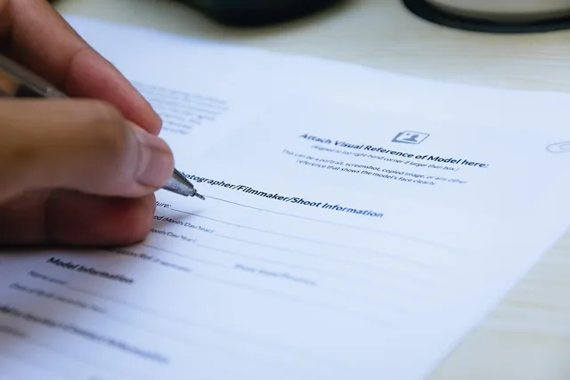 signing, paper, hand, close up, document, writing, pen, office, business, agreement, contract, paper, agreement, agreement, agreement, contract, contract, contract, contract, contract. Six creator-platform planning errors, starting with buying before the decision is defined